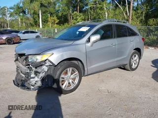 2014 Acura RDX Tech Pkg with VIN 5J8TB3H50EL014951, listed as a IAAI auction lot 41562583 with 129,833 mi miles. Bid and sale history available at carsss.com. Image 2.