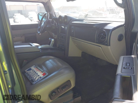 2005 Hummer H2 SUV with VIN 5GRGN23U35H105620, listed as a IAAI auction lot 41912574 with 232,938 mi miles. Bid and sale history available at carsss.com. Image 5.