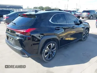 2021 Lexus UX with VIN JTHP3JBH2M2045075, listed as a IAAI auction lot 40979086 with 44,578 mi miles. Bid and sale history available at carsss.com. Image 4.