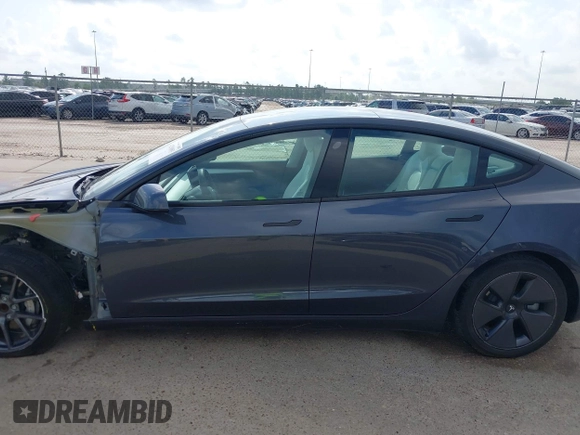 2023 Tesla Model 3 with VIN 5YJ3E1EA7PF567906, listed as a IAAI auction lot 42280993 with 41,452 mi miles and . Bid and sale history available at DreamBid. Image 15.