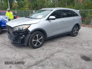 2016 Kia Sorento EX with VIN 5XYPH4A55GG041740, listed as a IAAI auction lot 41555876 with 166,255 mi miles. Bid and sale history available at carsss.com. Image 2.