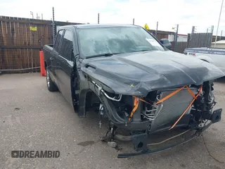 2024 Ram 1500 Tradesman with VIN 1C6SRFCT1RN233111, listed as a IAAI auction lot 42780732 with 13,014 mi miles and . Bid and sale history available at DreamBid. Image 1.