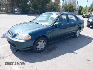 1998 Honda Civic EX with VIN JHMEJ8647WS001024, listed as a IAAI auction lot 41956420 with 198,954 mi miles. Bid and sale history available at carsss.com. Image 2.