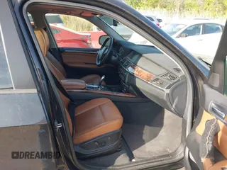 2010 BMW X5 35d with VIN 5UXFF0C52ALJ99499, listed as a IAAI auction lot 42109157 with 126,797 mi miles. Bid and sale history available at carsss.com. Image 5.