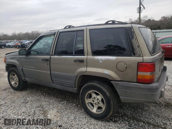 1996 Jeep Grand Cherokee Laredo with VIN 1J4FX58S5TC248122, listed as a Copart auction lot 45843935 with 295,521 mi miles and Salvage Title. Bid and sale history available at carsss.com. Image 2.
