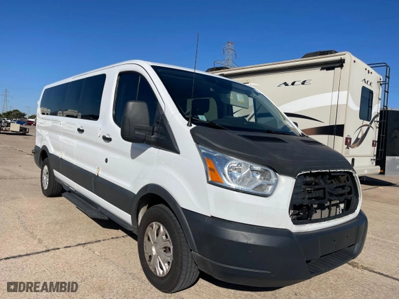 2016 Ford Transit Wagon XL with VIN 1FBZX2ZGXGKB47878, listed as a Copart auction lot 77989984 with 220,286 mi miles and Clean Title. Bid and sale history available at carsss.com. Image 1.