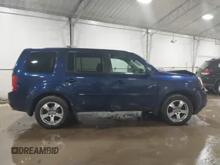 2015 Honda Pilot EX-L with VIN 5FNYF4H50FB040162, listed as a IAAI auction lot 41732726 with 149,003 mi miles and . Bid and sale history available at carsss.com. Image 13.