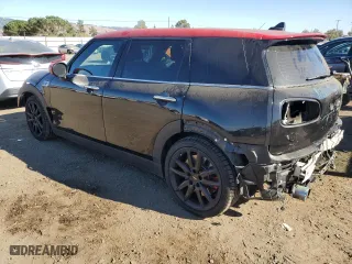 2020 MINI Clubman John Cooper Works with VIN WMWJZ9C06L2M15100, listed as a Copart auction lot 77621744 with 21,705 mi miles and Salvage Title. Bid and sale history available at carsss.com. Image 2.