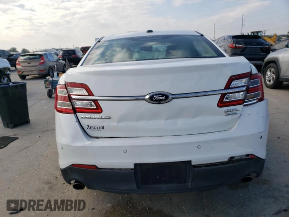 2015 Ford Taurus SEL with VIN 1FAHP2E9XFG175475, listed as a Copart auction lot 82369004 with 150,708 mi miles and Salvage title. Bid and sale history available at DreamBid. Image 6.