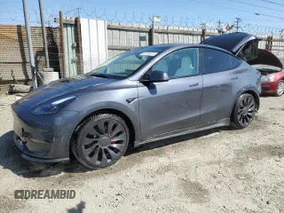 2023 Tesla Model Y Performance with VIN 7SAYGDEF0PF915030, listed as a Copart auction lot 50159375 with 19,772 mi miles and Salvage Title. Bid and sale history available at DreamBid. Image 1.