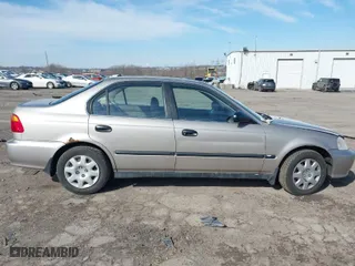 2000 Honda Civic LX with VIN 1HGEJ6679YL066102, listed as a IAAI auction lot 41585270 with 164,714 mi miles. Bid and sale history available at carsss.com. Image 12.