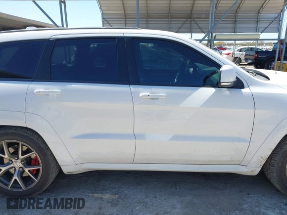 2017 Jeep Grand Cherokee SRT with VIN 1C4RJFDJ0HC699537, listed as a IAAI auction lot 41781500 with 105,640 mi miles. Bid and sale history available at carsss.com. Image 13.