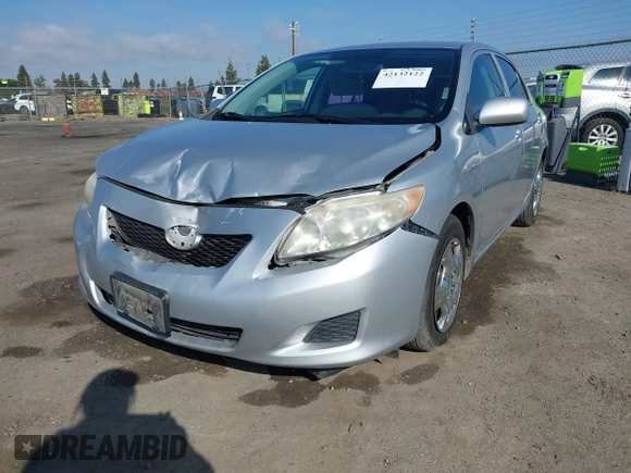 2009 Toyota Corolla with VIN JTDBL40E099056371, listed as a IAAI auction lot 42132122 with 204,016 mi miles and . Bid and sale history available at DreamBid. Image 2.