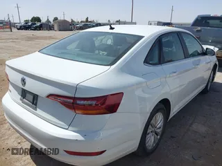 2019 Volkswagen Jetta S z VIN 3VWC57BU7KM110001, wystawiony jako IAAI lot #42244184 z przebiegiem 49 883 mil mil oraz . Historia ofert i sprzedaży dostępna na DreamBid. Obrazek 4.