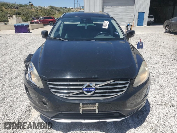2015 Volvo XC60 T5 z VIN YV4612RK7F2716797, wystawiony jako Copart lot #58010425 z przebiegiem 49 647 mil mil oraz Szkoda całkowita • Salvage title. Historia ofert i sprzedaży dostępna na DreamBid. Obrazek 5.