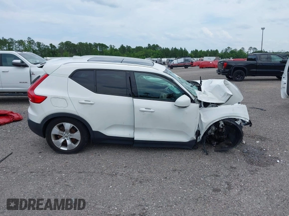 2019 Volvo XC40 Momentum z VIN YV4AC2HK7K2107905, wystawiony jako IAAI lot #40556146 z przebiegiem Nie podano mil oraz . Historia ofert i sprzedaży dostępna na DreamBid. Obrazek 12.