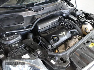 2016 MINI Countryman S z VIN WMWZC5C55GWU00997, wystawiony jako Copart lot #64326835 z przebiegiem 41 217 mil mil oraz Szkoda całkowita • Salvage title. Historia ofert i sprzedaży dostępna na DreamBid. Obrazek 7.
