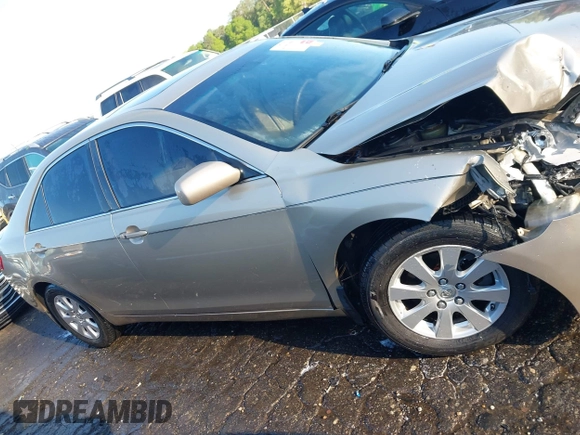 2007 Toyota Camry LE with VIN 4T1BK46K27U010739, listed as a IAAI auction lot 41983608 with 193,763 mi miles and . Bid and sale history available at DreamBid. Image 13.