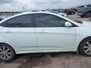 2013 Hyundai Accent GLS z VIN KMHCU4AE8DU275645, wystawiony jako IAAI lot #42139737 z przebiegiem 85 031 mil mil oraz . Historia ofert i sprzedaży dostępna na DreamBid. Obrazek 13.