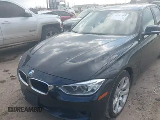 2014 BMW 3 Series 335i with VIN WBA3A9C54EF478025, listed as a IAAI auction lot 41513191 with 119,632 mi miles. Bid and sale history available at carsss.com. Image 2.