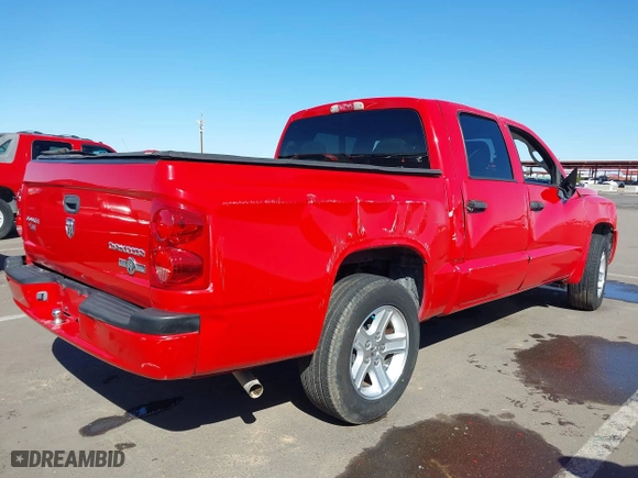 2011 Ram Dakota Bighorn/Lonestar with VIN 1D7RE3GK8BS511681, listed as a IAAI auction lot 41831464 with 157,259 mi miles. Bid and sale history available at carsss.com. Image 4.