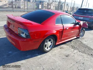 2001 Ford Mustang Standard with VIN 1FAFP40441F122154, listed as a IAAI auction lot 41866131 with 214,865 mi miles. Bid and sale history available at carsss.com. Image 4.