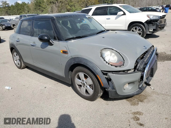 2016 MINI Hardtop 4 Door with VIN WMWXU1C55G2D09641, listed as a Copart auction lot 50567495 with 123,796 mi miles and Salvage Title. Bid and sale history available at DreamBid. Image 4.