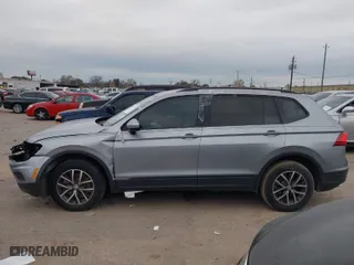 2021 Volkswagen Tiguan S with VIN 3VV1B7AX6MM053907, listed as a IAAI auction lot 41273925 with 109,761 mi miles. Bid and sale history available at carsss.com. Image 14.