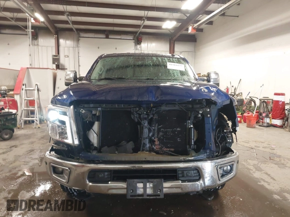 2017 Nissan Titan Pro-4X z VIN 1N6BA1F44HN551551, wystawiony jako IAAI lot #41581877 z przebiegiem 64 834 mil mil oraz . Historia ofert i sprzedaży dostępna na DreamBid. Obrazek 13.