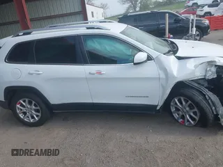 2017 Jeep Cherokee Latitude with VIN 1C4PJMCS3HD235562, listed as a IAAI auction lot 42203685 with 61,055 mi miles and . Bid and sale history available at DreamBid. Image 13.