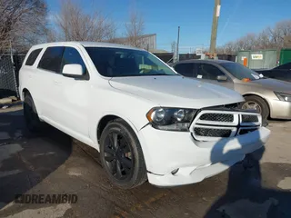 2013 Dodge Durango SXT z VIN 1C4RDJAG7DC565475, wystawiony jako IAAI lot #41642958 z przebiegiem 177 685 mil mil oraz . Historia ofert i sprzedaży dostępna na DreamBid. Obrazek 1.