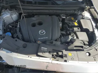 2020 Mazda CX-5 Touring z VIN JM3KFBCM2L1824072, wystawiony jako Copart lot #54825295 z przebiegiem 99 420 mil mil oraz Szkoda całkowita • Salvage title. Historia ofert i sprzedaży dostępna na DreamBid. Obrazek 12.