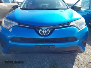 2016 Toyota RAV4 LE with VIN JTMBFREV2GD183811, listed as a IAAI auction lot 42216793 with 95,270 mi miles and . Bid and sale history available at DreamBid. Image 6.