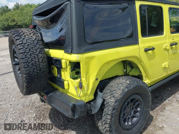 2023 Jeep Wrangler Sport with VIN 1C4HJXDG5PW693865, listed as a IAAI auction lot 40068881 with 12,149 mi miles and . Bid and sale history available at DreamBid. Image 6.