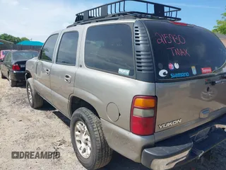 2002 GMC Yukon SLT with VIN 1GKEK13Z72R215930, listed as a IAAI auction lot 42024342 with 294,069 mi miles. Bid and sale history available at carsss.com. Image 3.