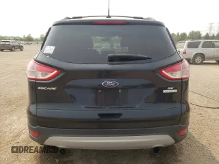 2013 Ford Escape SE with VIN 1FMCU0GXXDUA98419, listed as a Copart auction lot 59233695 with 151,615 mi miles and Salvage title. Bid and sale history available at DreamBid. Image 6.