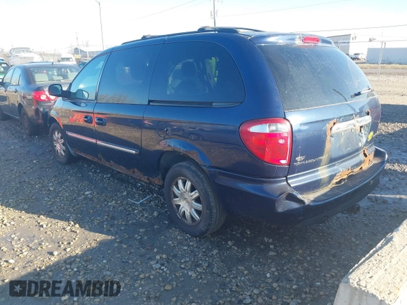 2006 Chrysler Town & Country Touring with VIN 2A4GP54L46R805276, listed as a IAAI auction lot 41036582 with 145,534 mi miles and . Bid and sale history available at DreamBid. Image 3.