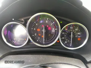 2021 Mazda MX-5 Miata Grand Touring z VIN JM1NDAM75M0451597, wystawiony jako IAAI lot #41932712 z przebiegiem 61 710 mil mil oraz . Historia ofert i sprzedaży dostępna na DreamBid. Obrazek 7.