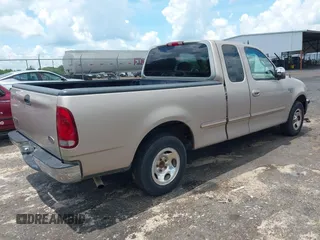 1998 Ford F-150 with VIN 1FTZX1760WNB21027, listed as a IAAI auction lot 42651506 with 189,442 mi miles and . Bid and sale history available at DreamBid. Image 4.