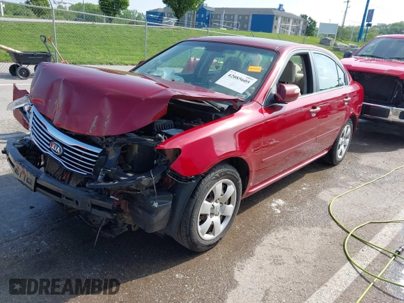 2010 Kia Optima LX z VIN KNAGG4A88A5435095, wystawiony jako IAAI lot #42085605 z przebiegiem 188 685 mil mil oraz . Historia ofert i sprzedaży dostępna na DreamBid. Obrazek 2.