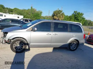 2018 Dodge Grand Caravan SXT with VIN 2C4RDGCG5JR267428, listed as a IAAI auction lot 41877661 with 103,633 mi miles and . Bid and sale history available at DreamBid. Image 15.