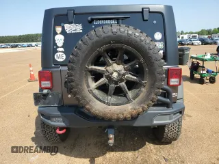 2016 Jeep Wrangler Unlimited Rubicon with VIN 1C4HJWFG8GL235746, listed as a Copart auction lot 51219135 with 79,612 mi miles and Salvage Title. Bid and sale history available at carsss.com. Image 6.