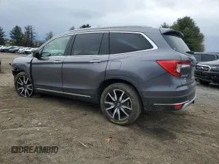2020 Honda Pilot Touring 7-Passenger z VIN 5FNYF6H69LB005829, wystawiony jako Copart lot #52702555 z przebiegiem 90 746 mil mil oraz Szkoda całkowita • Salvage title. Historia ofert i sprzedaży dostępna na DreamBid. Obrazek 2.