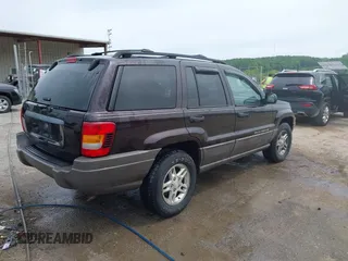 2004 Jeep Grand Cherokee Laredo z VIN 1J4GW48S94C209326, wystawiony jako IAAI lot #42309565 z przebiegiem 159 429 mil mil oraz . Historia ofert i sprzedaży dostępna na DreamBid. Obrazek 4.