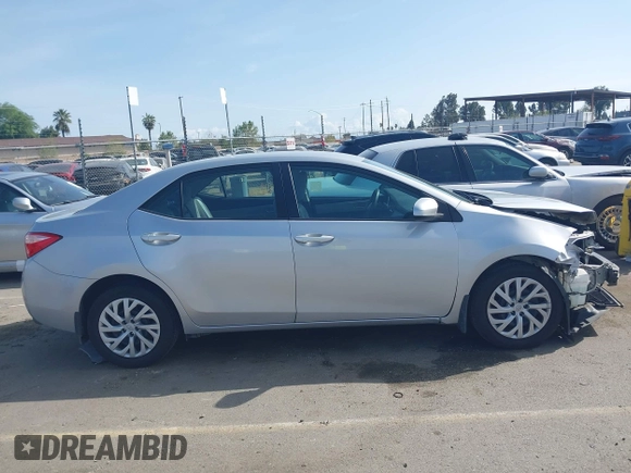 2019 Toyota Corolla L with VIN 2T1BURHE2KC190975, listed as a IAAI auction lot 41901370 with 94,925 mi miles. Bid and sale history available at carsss.com. Image 14.