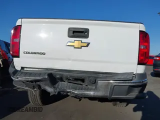 2019 Chevrolet Colorado 2WD Work Truck with VIN 1GCGSBEA1K1115077, listed as a IAAI auction lot 41653601 with 92,537 mi miles and . Bid and sale history available at DreamBid. Image 6.