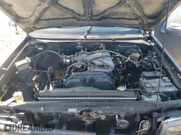 1997 Toyota T100 SR5 with VIN JT4UN24D8V0043620, listed as a Copart auction lot 86747534 with 185,470 mi miles and Salvage Title. Bid and sale history available at DreamBid. Image 11.