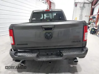2021 Ram 1500 Big Horn z VIN 1C6SRFBT8MN696504, wystawiony jako IAAI lot #41669093 z przebiegiem 63 356 mil mil oraz . Historia ofert i sprzedaży dostępna na DreamBid. Obrazek 16.