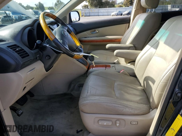 2007 Lexus RX 400h with VIN JTJGW31U572003410, listed as a Copart auction lot 54107905 with 216,972 mi miles and Clean Title. Bid and sale history available at DreamBid. Image 7.
