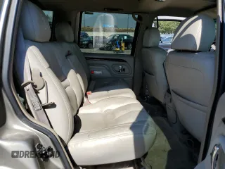 2000 Cadillac Escalade z VIN 1GYEK63R8YR228214, wystawiony jako Copart lot #73567434 z przebiegiem 235 399 mil mil oraz Szkody całkowita. Historia ofert i sprzedaży dostępna na DreamBid. Obrazek 11.